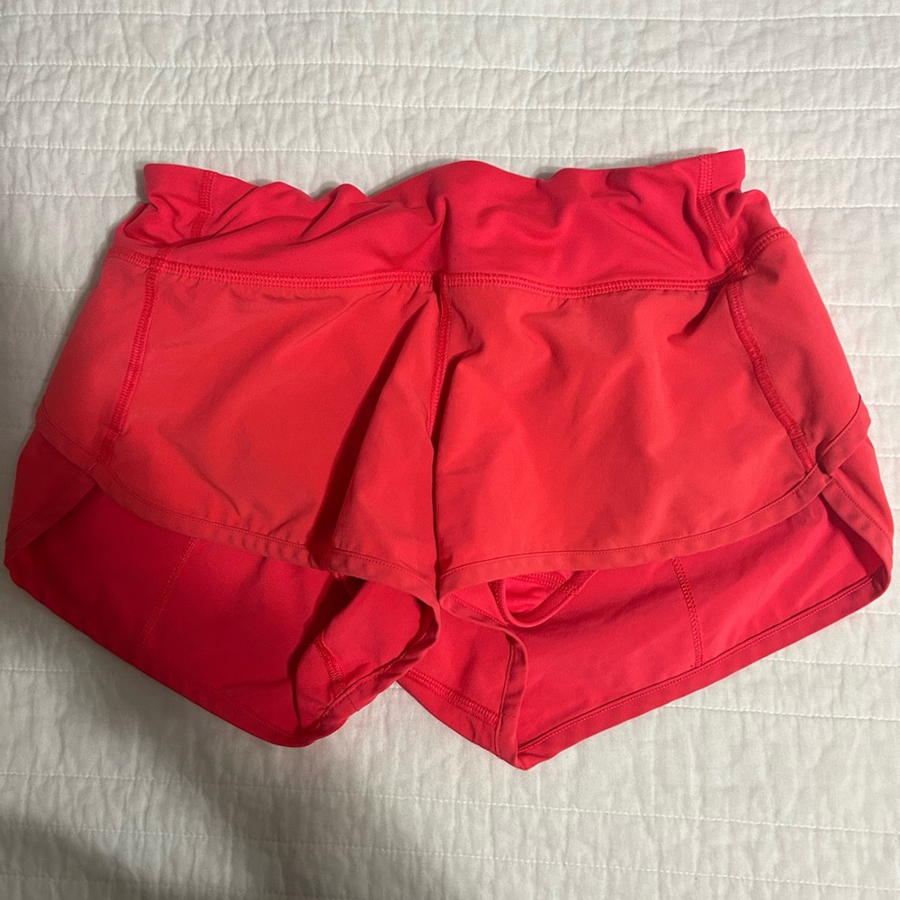 Hot pink lululemon speed up shorts